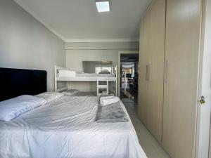 Ένα ή περισσότερα κρεβάτια σε δωμάτιο στο Apartamento Vista mar