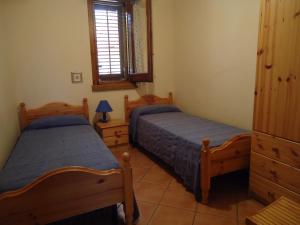 A bed or beds in a room at Villetta Mare