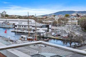 a view of a harbor with a marina at Gibson Mill waterfront warehouse apartment - 204 in Hobart