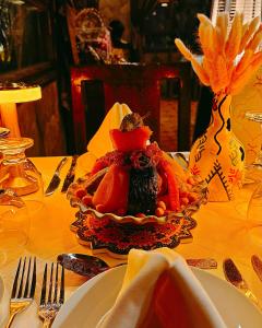 a plate of food sitting on a table at Riad Chay & Boutique in Ouarzazate