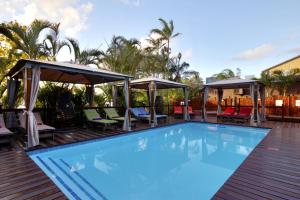 The swimming pool at or close to Urban Glamping Tranquil Backpacking Village