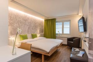 TV a/nebo společenská místnost v ubytování Hotel Weiss Kreuz