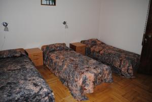Postel nebo postele na pokoji v ubytování Daugavkrasti Hotel