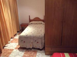Postel nebo postele na pokoji v ubytování Pensión Princesa