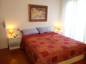 Säng eller sängar i ett rum på Villa Betta