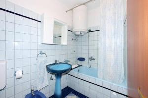 Kúpeľňa v ubytovaní Apartment Elena + 22 fotografií