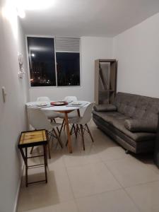 Χώρος καθιστικού στο Agradable y cómodo Apartamento Eje Cafetero