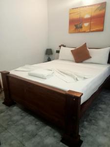 Postel nebo postele na pokoji v ubytování Oviniru Beach Hotel