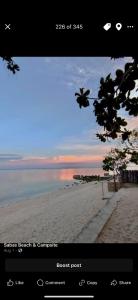 a picture of a beach with a view of the ocean at Sabas Beach and Campsite in Siquijor