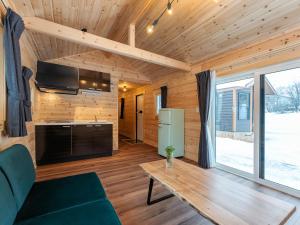 TV a/nebo společenská místnost v ubytování Myoko Onsen cottage Ajisai + 37 fotografií
