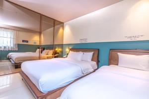 Hotel Lemong客房内的一张或多张床位
