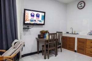 Kuchyň nebo kuchyňský kout v ubytování แอนฟาร์มรีสอร์ทแอนด์คาเฟ่