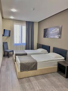 Postel nebo postele na pokoji v ubytování Bien hotel