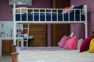 Postel nebo postele na pokoji v ubytování แอนฟาร์มรีสอร์ทแอนด์คาเฟ่