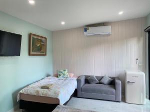 Posezení v ubytování แอนฟาร์มรีสอร์ทแอนด์คาเฟ่