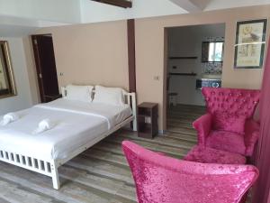 Postel nebo postele na pokoji v ubytování Momento Resort