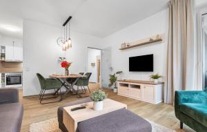 a living room with a couch and a table at Schleieck in Kappeln