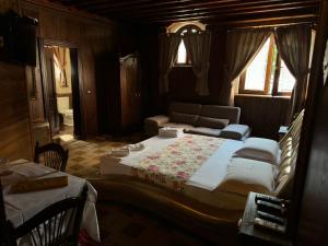 Postel nebo postele na pokoji v ubytování Hotel Iliada