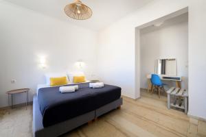 Postel nebo postele na pokoji v ubytování Aquarius Beach Hotel