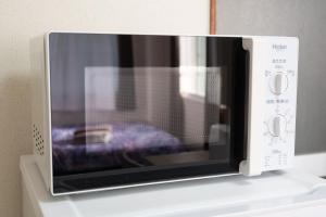 TV a/nebo společenská místnost v ubytování カプリス豊平公園305