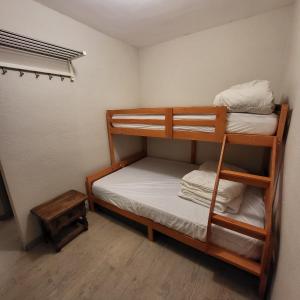 Postel nebo postele na pokoji v ubytování Le Sappey 31