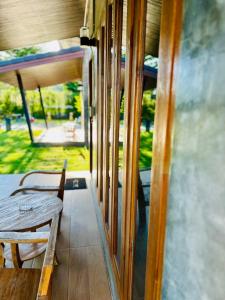 Balkón nebo terasa v ubytování The Loft Baannaisuan + 11 fotografií