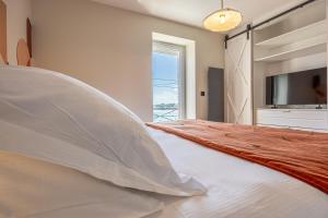 Osiris - Magnifique appt vue mer avec rooftop客房内的一张或多张床位