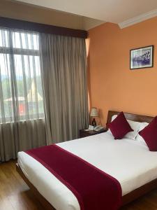 Letto o letti in una camera di Airport Hotel