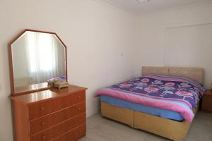 Postel nebo postele na pokoji v ubytování Marka Suites Comfort