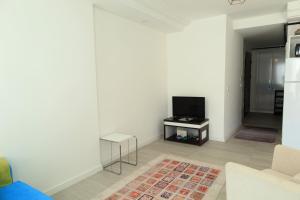 TV a/nebo společenská místnost v ubytování Marka Suites Comfort