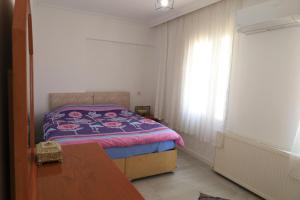 Postel nebo postele na pokoji v ubytování Marka Suites Comfort