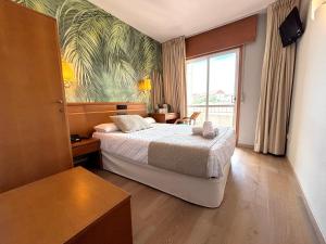 A bed or beds in a room at Hotel Atalaya I Még 37 kép