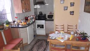 Kuchyň nebo kuchyňský kout v ubytování Zum Bauernhof mit Pension + 2 fotografie