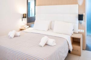 Llit o llits en una habitació de Orizontes Hotel Santorini