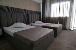 Postelja oz. postelje v sobi nastanitve Hotel Parc