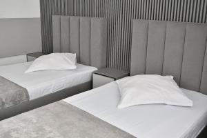 Postelja oz. postelje v sobi nastanitve Hotel Parc