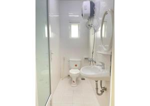 Koupelna v ubytování Hân Hoan Hotel