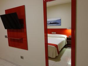 Postel nebo postele na pokoji v ubytování Hotel Andrea´s