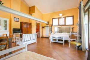 TV a/nebo společenská místnost v ubytování Agriturismo L.B.STUD