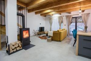 TV a/nebo společenská místnost v ubytování Resort Biela Skala - CHALETKA Chopok Jasná Juh