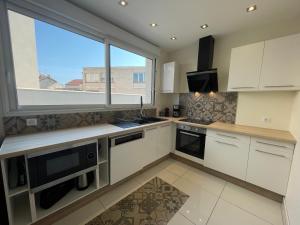 Kuchyň nebo kuchyňský kout v ubytování Superbe LOFT centre-ville Montluçon + 16 fotografií
