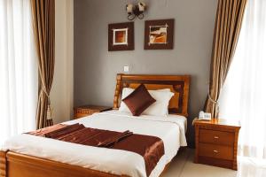 Ένα ή περισσότερα κρεβάτια σε δωμάτιο στο Highlands Apartment +41 φωτογραφίες
