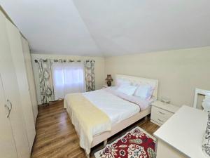 Ένα ή περισσότερα κρεβάτια σε δωμάτιο στο Tedi's Home