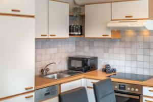Kuchyňa alebo kuchynka v ubytovaní Appartement Köll