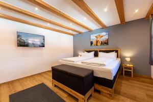 Postel nebo postele na pokoji v ubytování Alpenherz