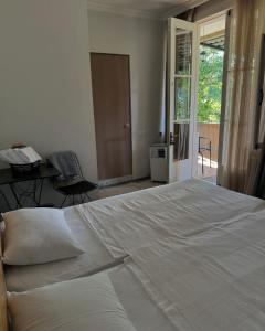 Postel nebo postele na pokoji v ubytování View Racha