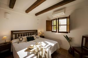 Posteľ alebo postele v izbe v ubytovaní Can Noves - Villa de 5 suites 9 y 31
