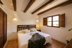 Posteľ alebo postele v izbe v ubytovaní Can Noves - Villa de 5 suites 9 y 31