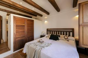 Posteľ alebo postele v izbe v ubytovaní Can Noves - Villa de 5 suites 9 y 31