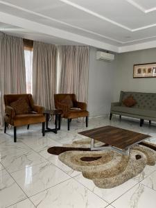 Ruang duduk di Genesis Reventon Hotel